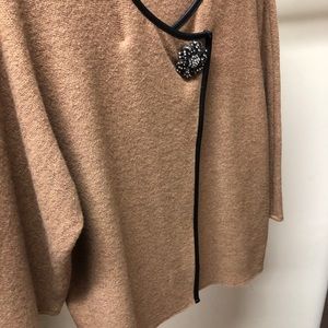 Jacket in tan boiled wool with faux leather trim!